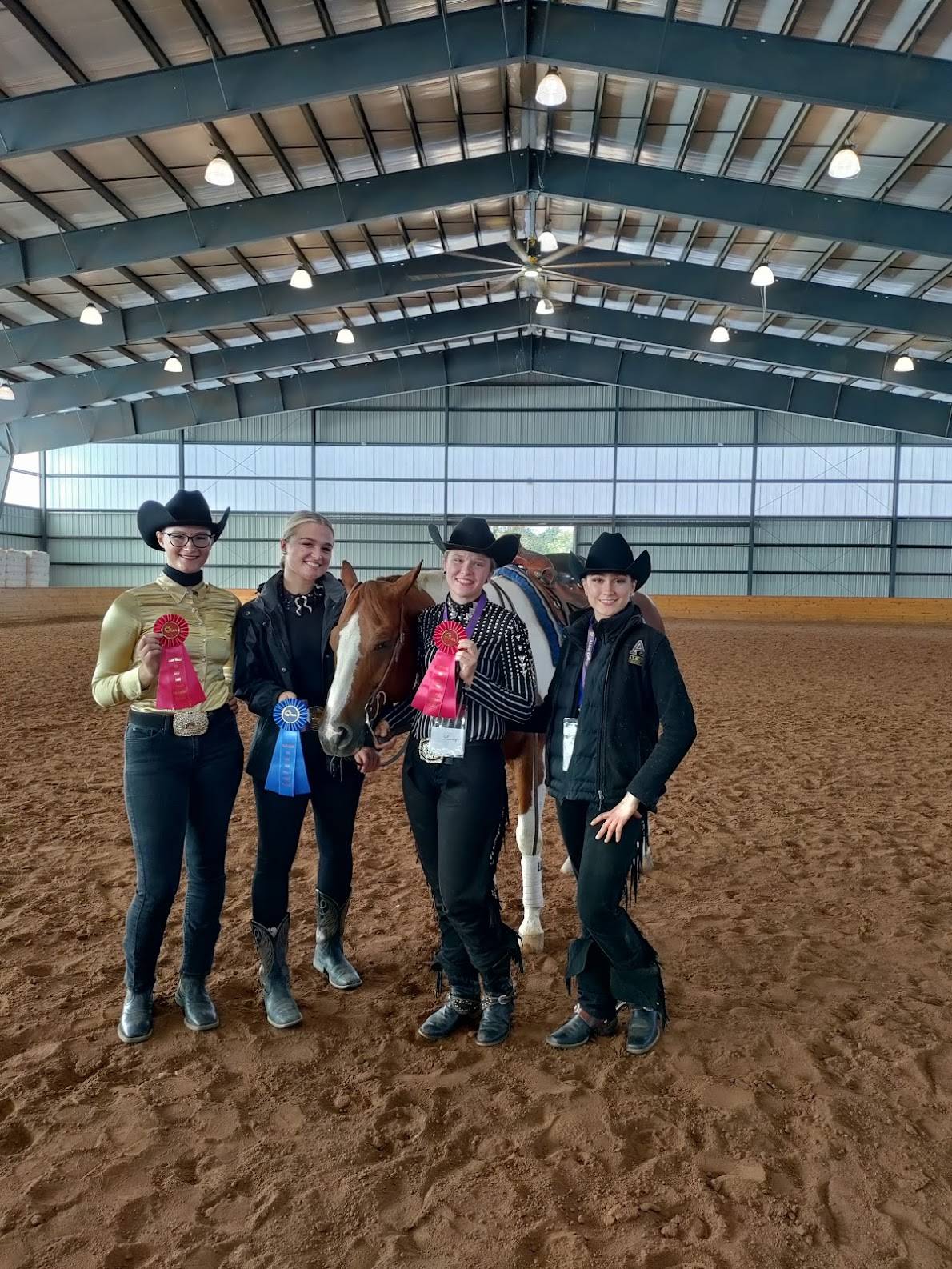Riders Taylor Kalfayan, Gracie Endres, and Whitney Boerman pictured with horse Ty and his owner Marty Cash